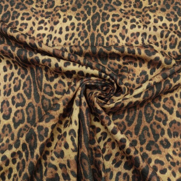 Tessuto Maglia Mano Lana a fantasia motivo animalier nero - beige - marrone