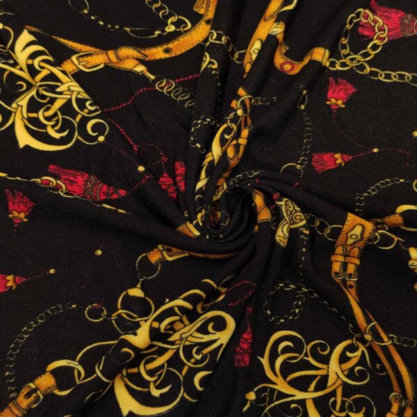 Tessuto Jersey peso autunnale a fantasia motivo astratto oro - rosso - nero