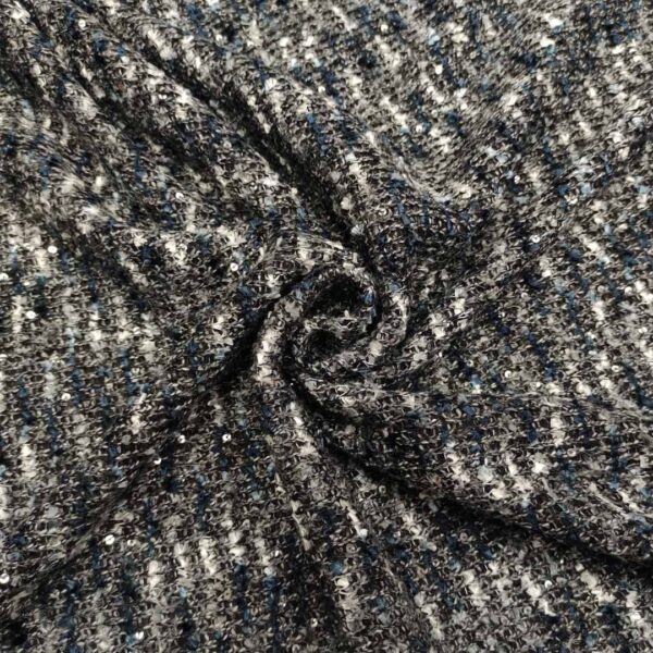 Tessuto Jersey peso autunnale motivo tweed ricamato con paillettes grigio - nero - blu