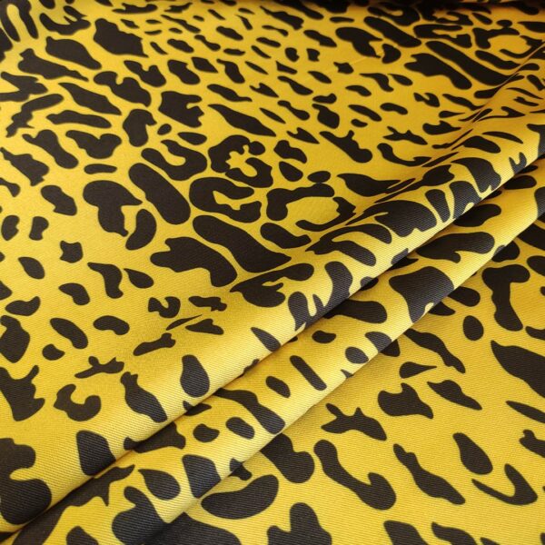 Tessuto Mikado a fantasia motivo animalier giallo - nero