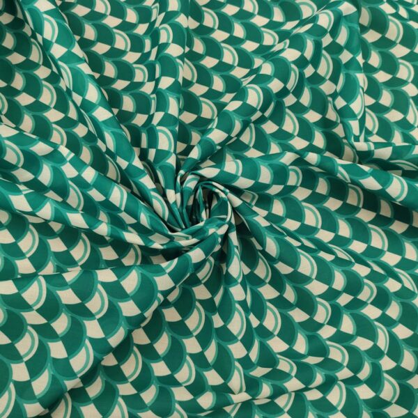 Tessuto Mussola di Cotone a fantasia motivo geometrico verde smeraldo - panna
