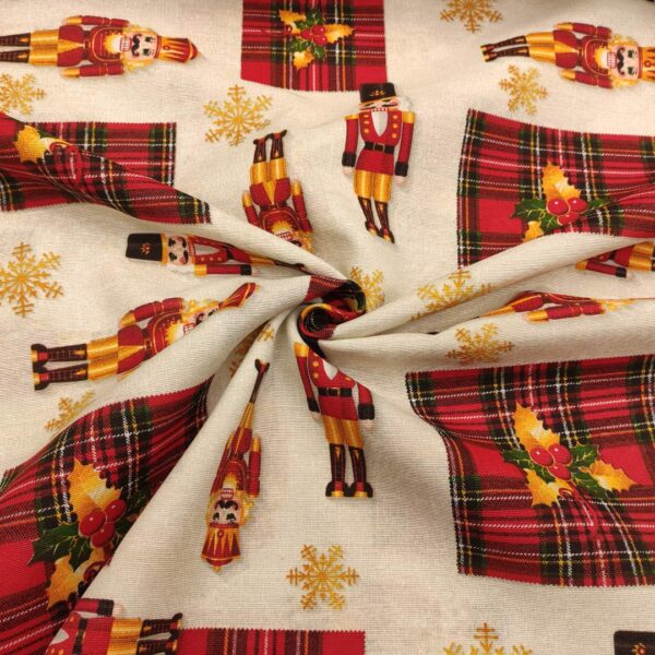 Tessuto Natalizio Decorativo a fantasia panama con schiaccianoci rosso - beige - nero