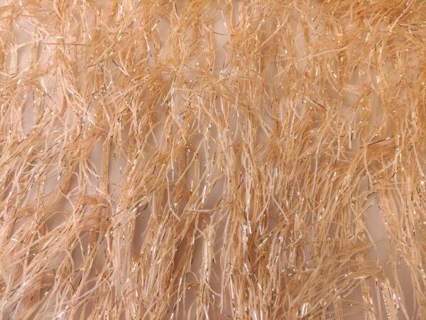 Tessuto organza con frange lurex oro