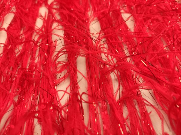 Tessuto organza con frange lurex rosso