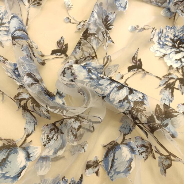 Tessuto Organza a fantasia motivo floreale bianco - carta da zucchero - nero