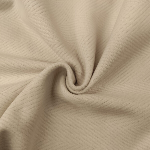 Tessuto per cappotto motivo spigato in tinta unita panna