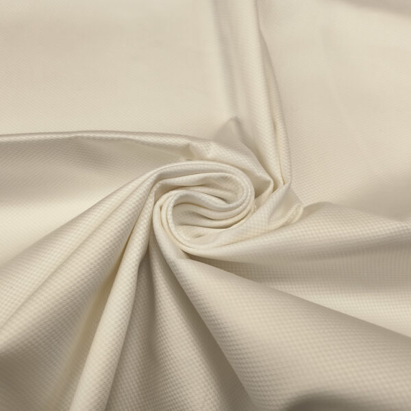 Tessuto Piquet di cotone elasticizzato tinta unita bianco seta