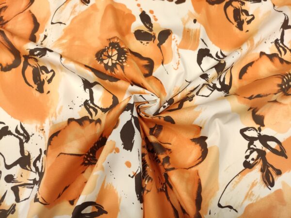Tessuto Piquet di cotone a fantasia motivo floreale bianco - arancione