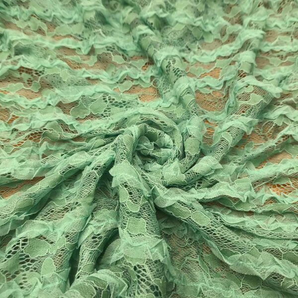 Tessuto pizzo con balze in tulle tinta unita verde tiffany
