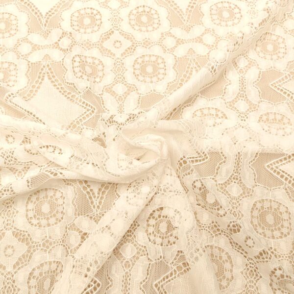 Tessuto pizzo elasticizzato doppio smerlo motivo geometrico bianco seta