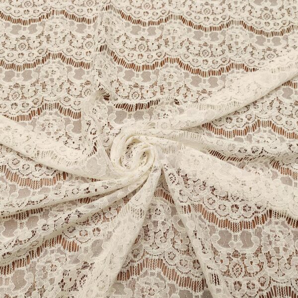 Tessuto pizzo elasticizzato motivo astratto bianco seta