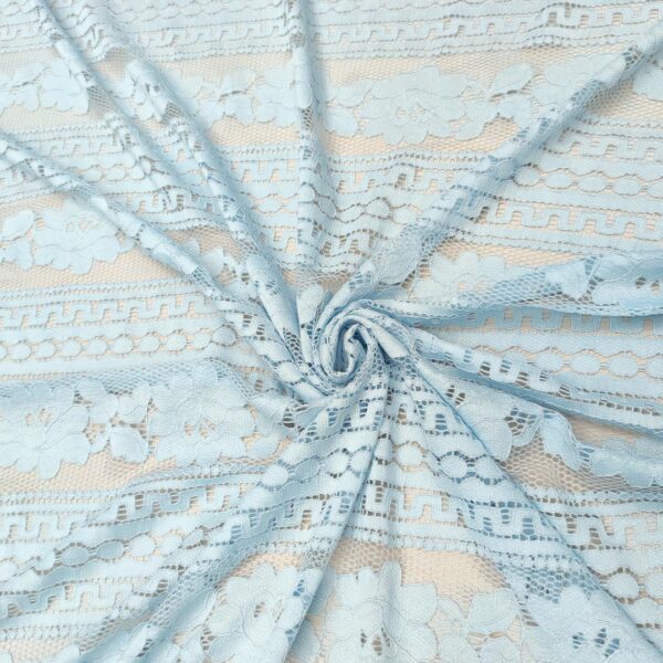Tessuto pizzo elasticizzato motivo astratto celeste