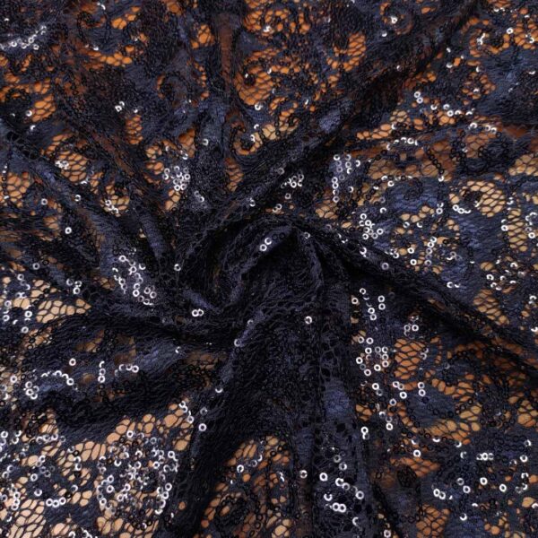 Tessuto pizzo elasticizzato ricamato con paillettes motivo floreale blu