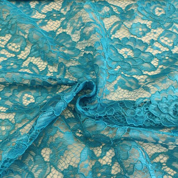 Tessuto Pizzo rebrodè rosso turchese