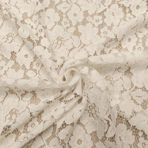 Tessuto Pizzo Rebrodè tinta unita motivo floreale bianco seta