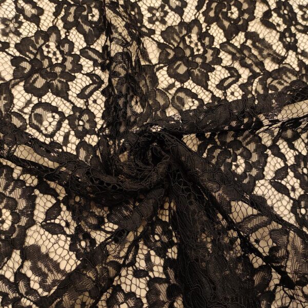 Tessuto Pizzo Rebrodè doppio smerlo tinta unita motivo floreale nero