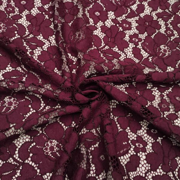 Tessuto Pizzo Rebrodè tinta unita motivo floreale vinaccio