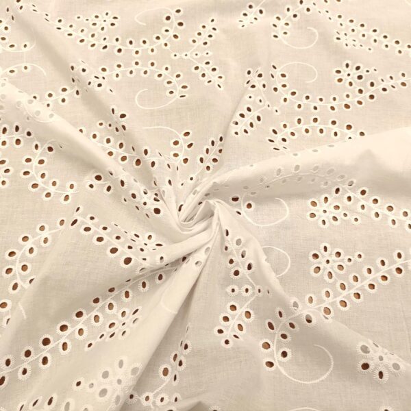 Tessuto Sangallo doppio smerlo motivo astratto bianco ottico