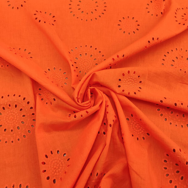 Tessuto Sangallo doppio smerlo motivo astratto arancione