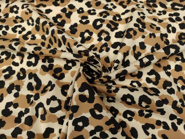 Tessuto Popeline di cotone a fantasia motivo animalier beige - marrone