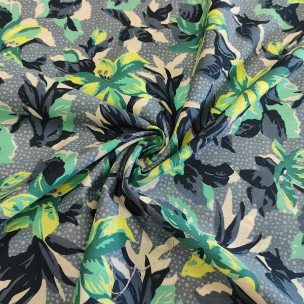 Tessuto Popeline di cotone a fantasia motivo floreale celeste - lime - blu