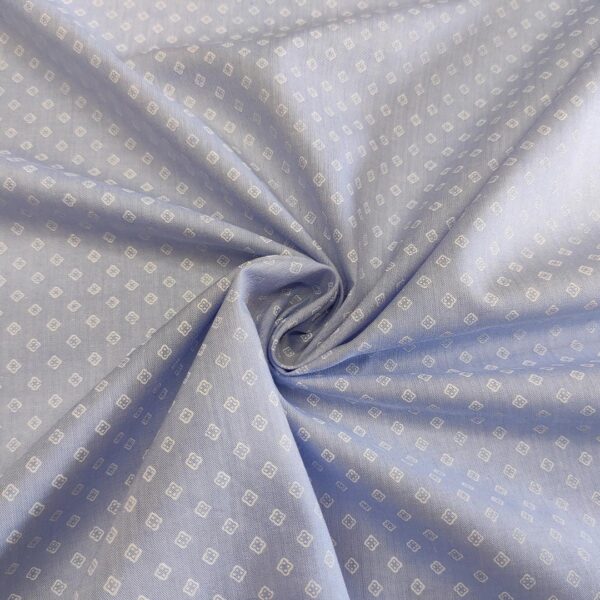 Tessuto Popeline di cotone a fantasia motivo geometrico celeste - bianco