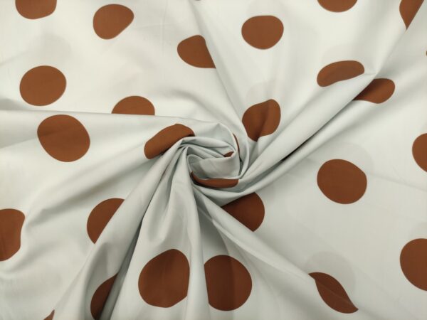 Tessuto Popeline di cotone a fantasia motivo pois bianco - tabacco