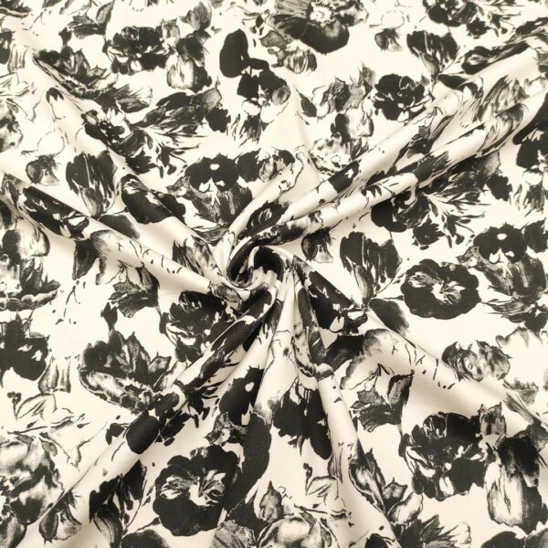Tessuto Rasatello di cotone a fantasia motivo floreale bianco - nero