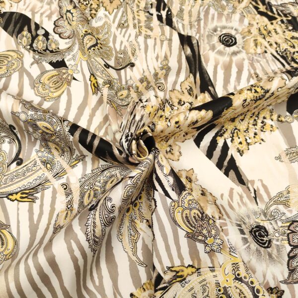 Tessuto Rasatello di cotone a fantasia motivo astratto beige - oro - nero - bianco