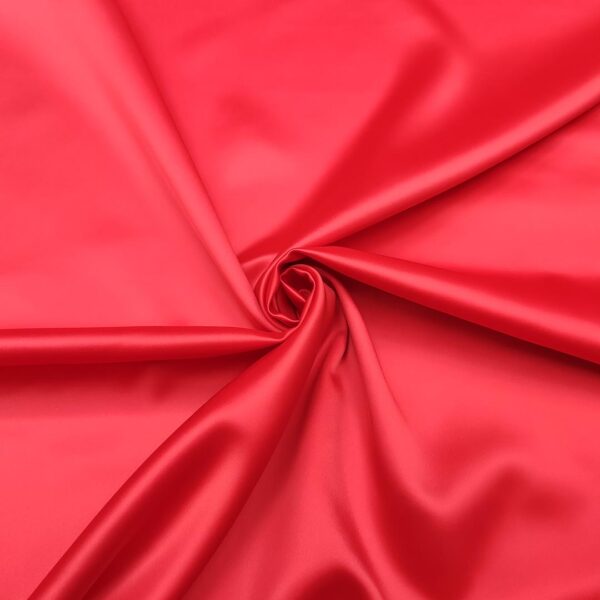 Tessuto Raso elasticizzato tinta unita corallo scuro