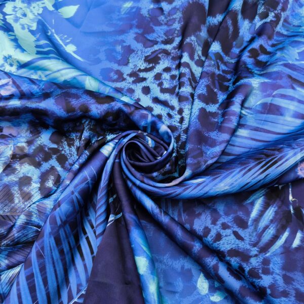Tessuto Satin a fantasia motivo animalier blu elettrico - celeste - fucsia