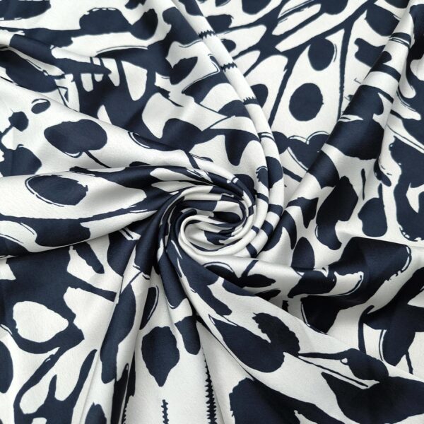 Tessuto Satin a fantasia motivo astratto blu navy - bianco