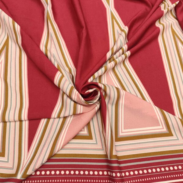 Tessuto Crepe elasticizzato a fantasia motivo astratto bordeaux - rosa
