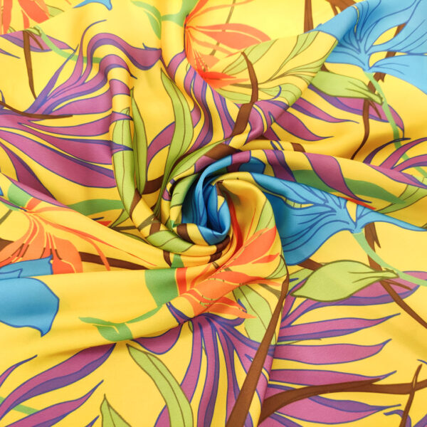 Tessuto Satin a fantasia motivo floreale giallo - azzurro - viola