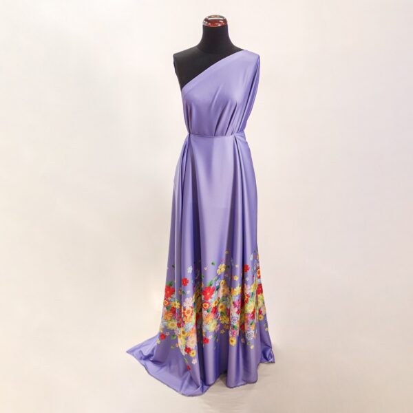 Tessuto Satin a fantasia motivo floreale fondo lilla