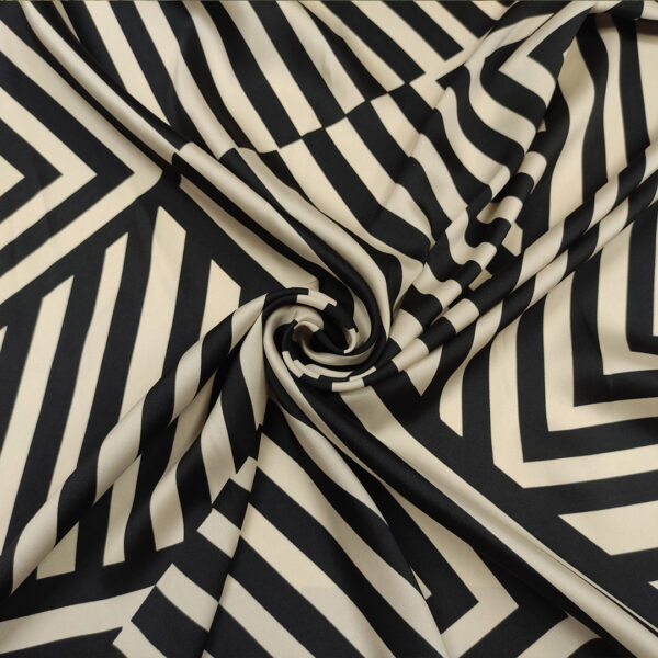 Tessuto Satin a fantasia motivo geometrico panna - nero