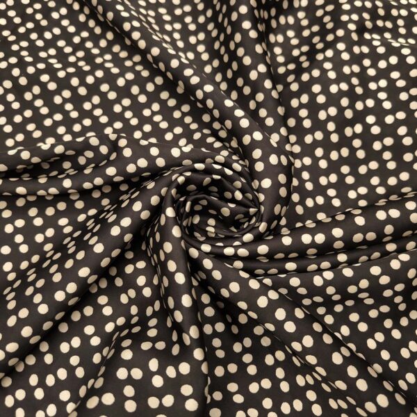 Tessuto Satin a fantasia motivo pois piccolo panna - nero