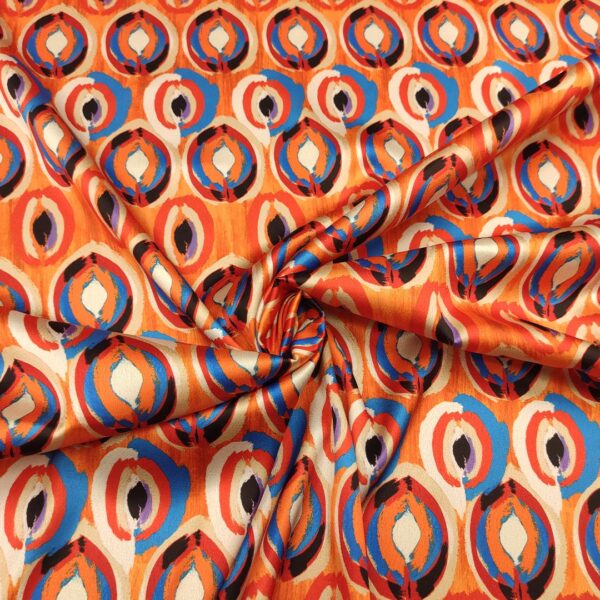 Tessuto Satin elasticizzato a fantasia motivo astratto arancione - blu - lilla - nero