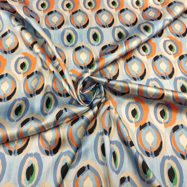 Tessuto Satin elasticizzato a fantasia motivo astratto celeste - arancione - panna
