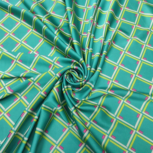 Tessuto Satin elasticizzato a fantasia motivo geometrico acquamarina  - verde fluo - fucsia