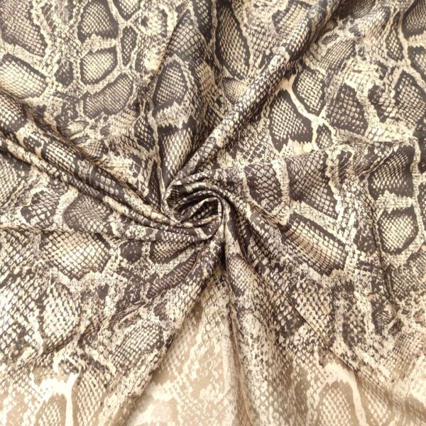 Tessuto Satin elasticizzato a fantasia motivo animalier marrone - beige