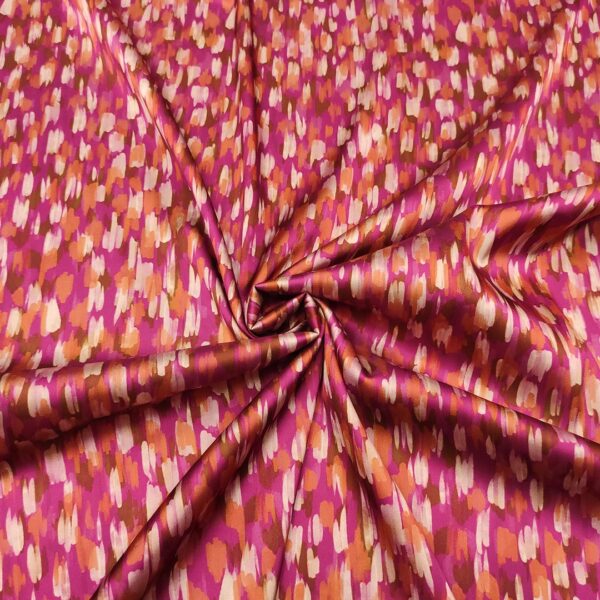 Tessuto Satin elasticizzato a fantasia motivo astratto magenta - ruggine - rosa