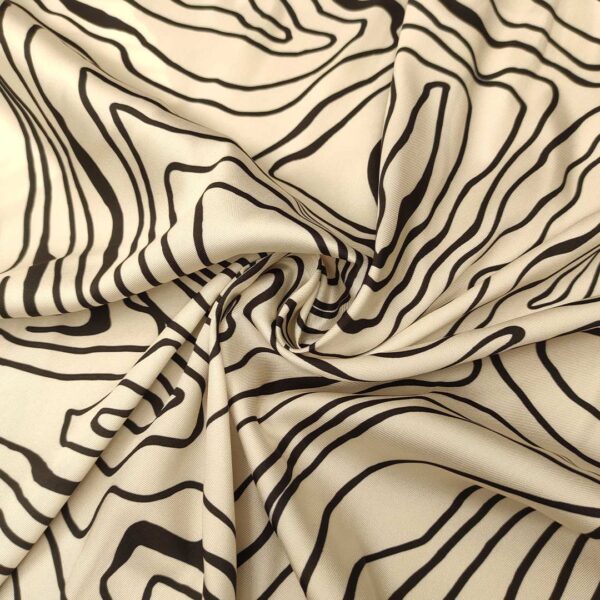 Tessuto Satin a fantasia motivo astratto panna - nero