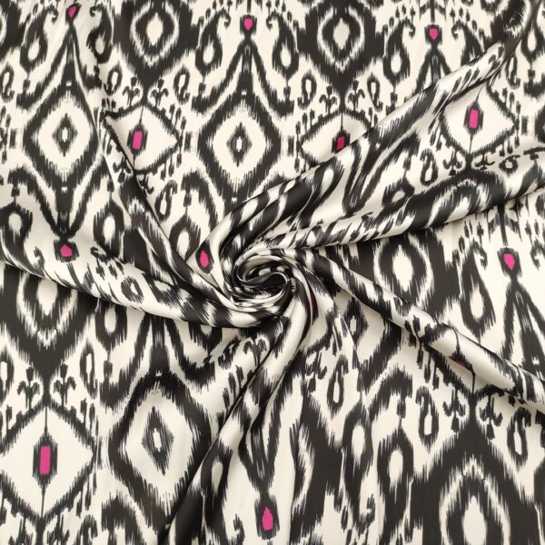 Tessuto Satin a fantasia motivo etnico bianco - nero - fucsia