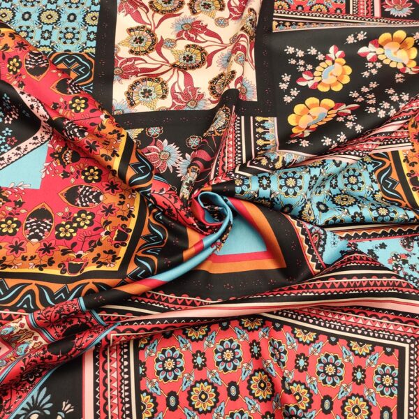 Tessuto Satin a fantasia motivo etnico rosso - nero - turchese