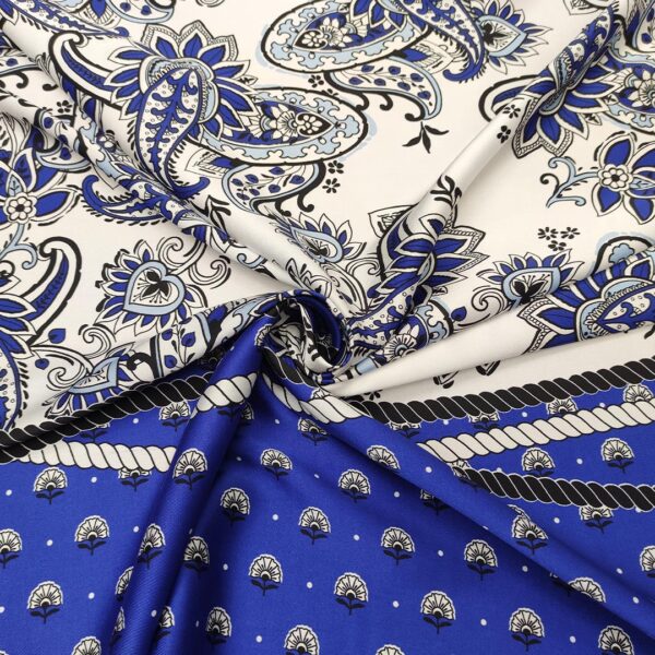 Tessuto Satin a fantasia motivo floreale cashmere blu elettrico - bianco - nero