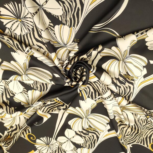 Tessuto Satin a fantasia motivo floreale nero - panna - ocra