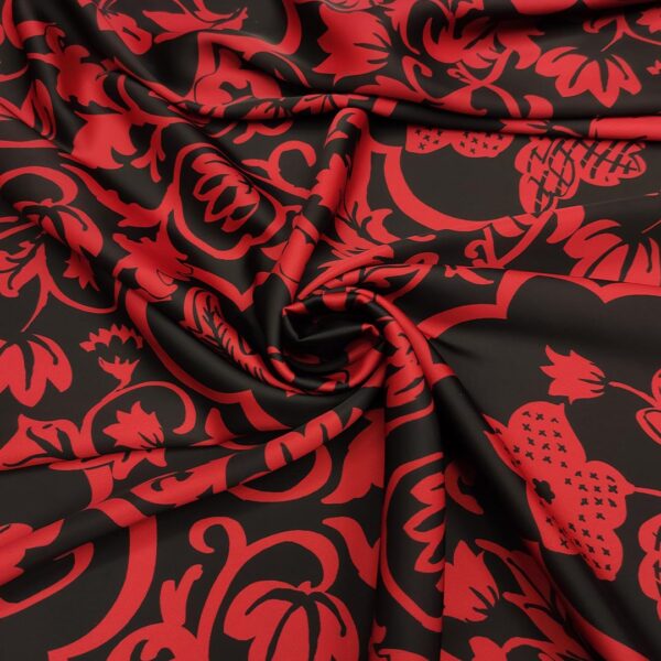 Tessuto Satin a fantasia motivo floreale nero - rosso