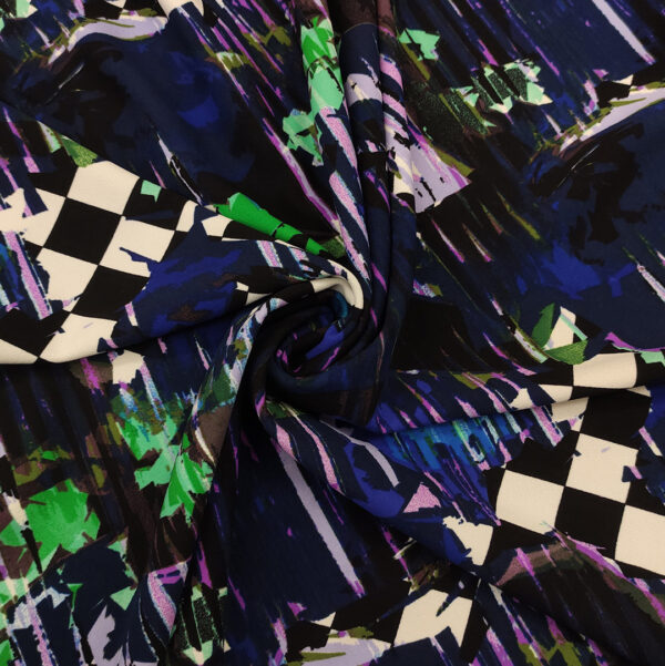 Tessuto Scuba Crepe a fantasia motivo astratto blu - verde - viola