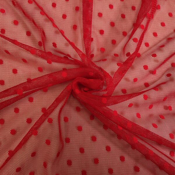 Tessuto Tulle elasticizzato tinta unita motivo pois